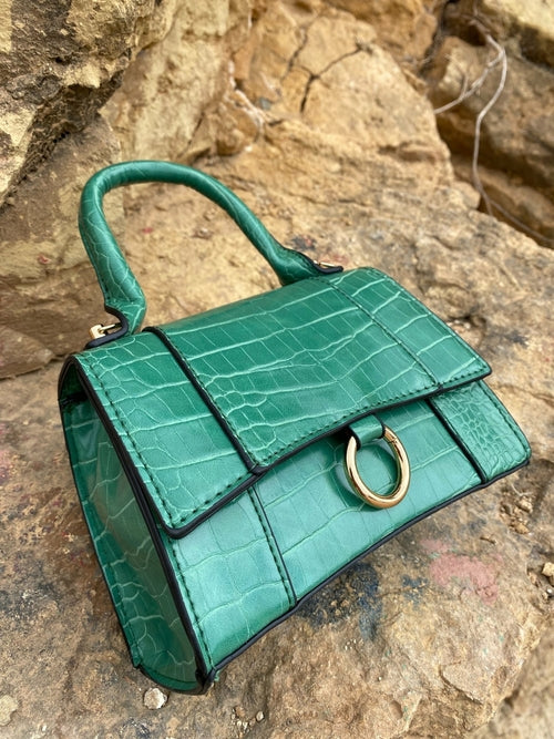 Axelremsväska med djurmönster och spänne