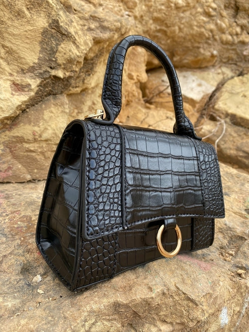 Axelremsväska med djurmönster och spänne