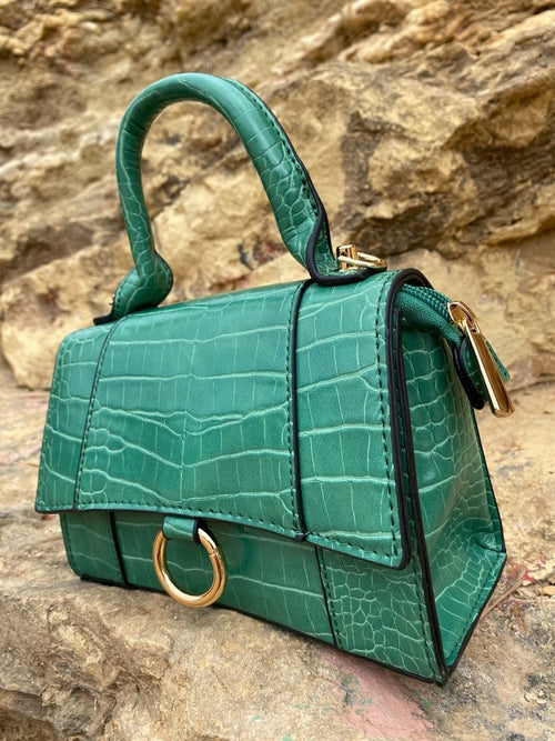 Axelväska med djurmönster och spänne